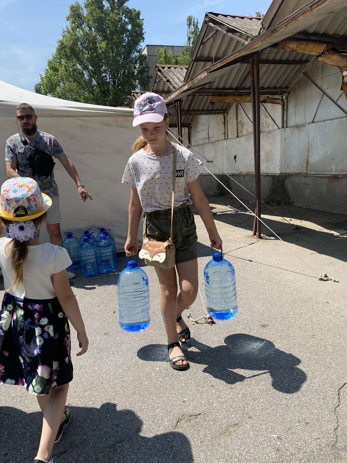 Ukraine Girl carrying water
